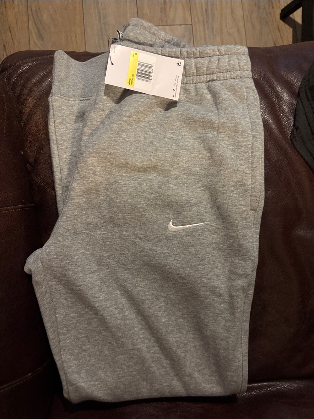 Nike Mens Heather Gray Sweat Joggers with White Swoosh